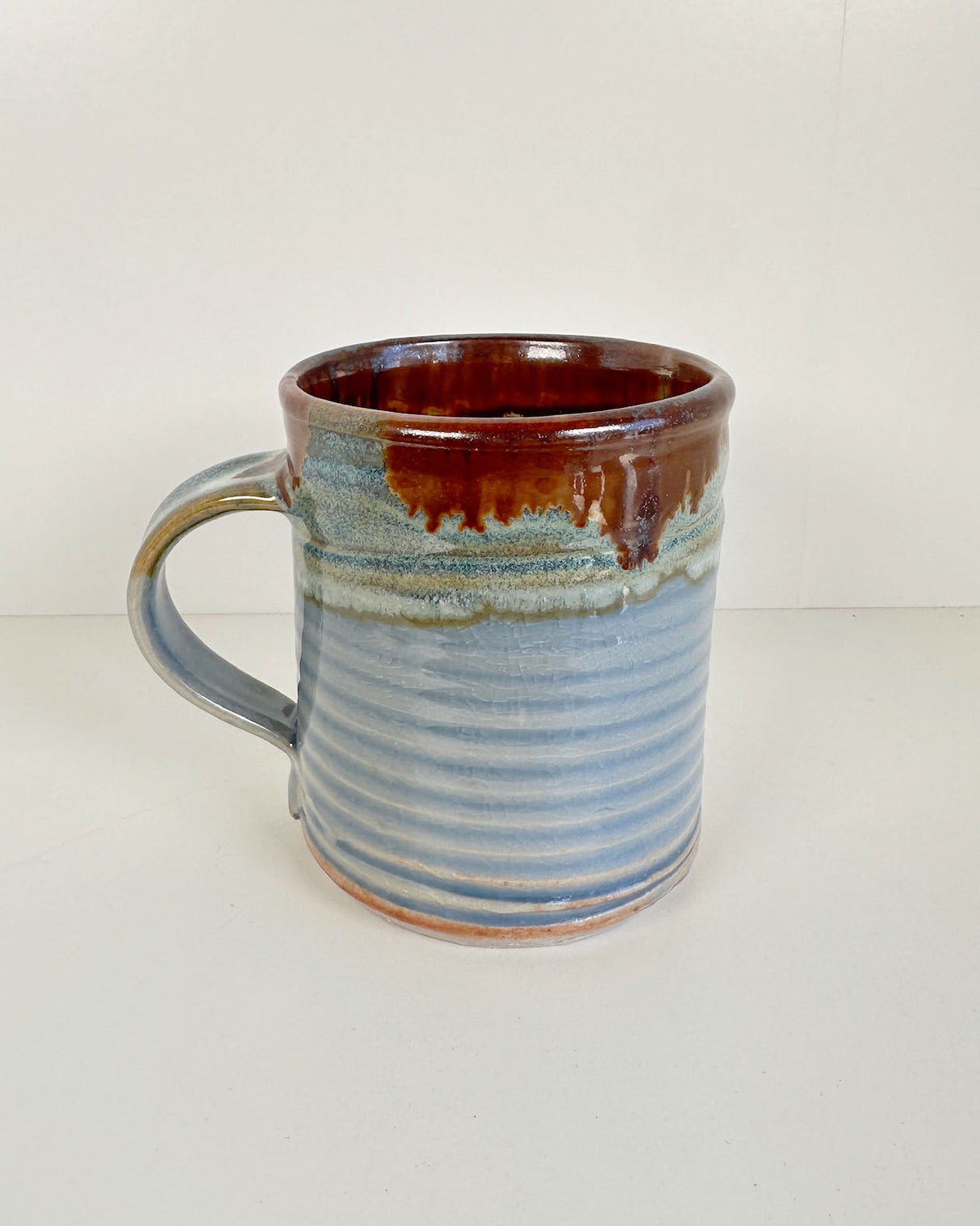 Ribbed Pale Blue and Rich Rust Red Stoneware Mug | Lowell Baker