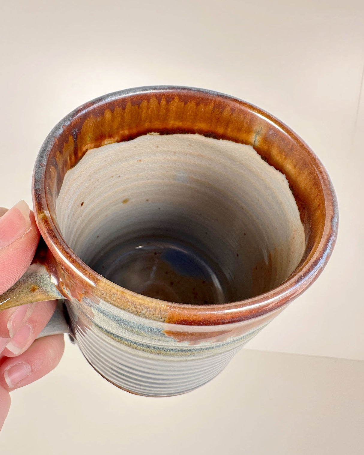 Ribbed Pale Blue and Rich Rust Red Stoneware Mug | Lowell Baker