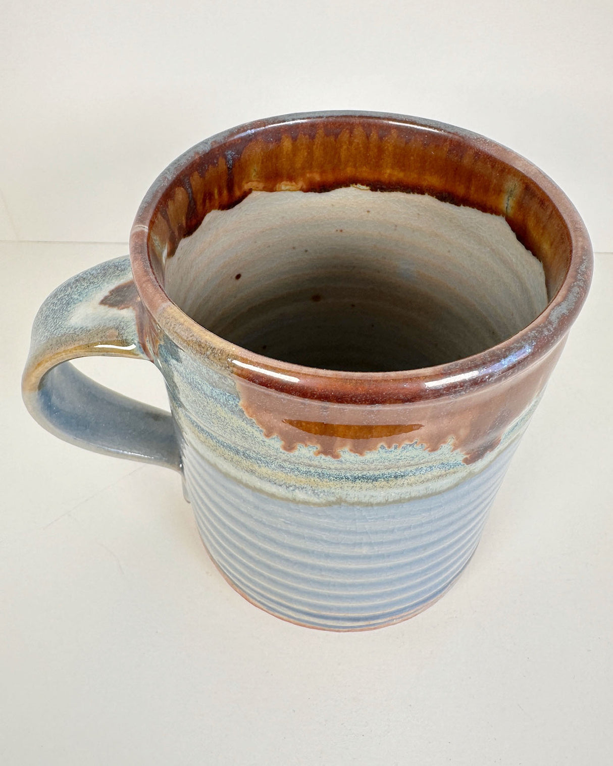 Ribbed Pale Blue and Rich Rust Red Stoneware Mug | Lowell Baker
