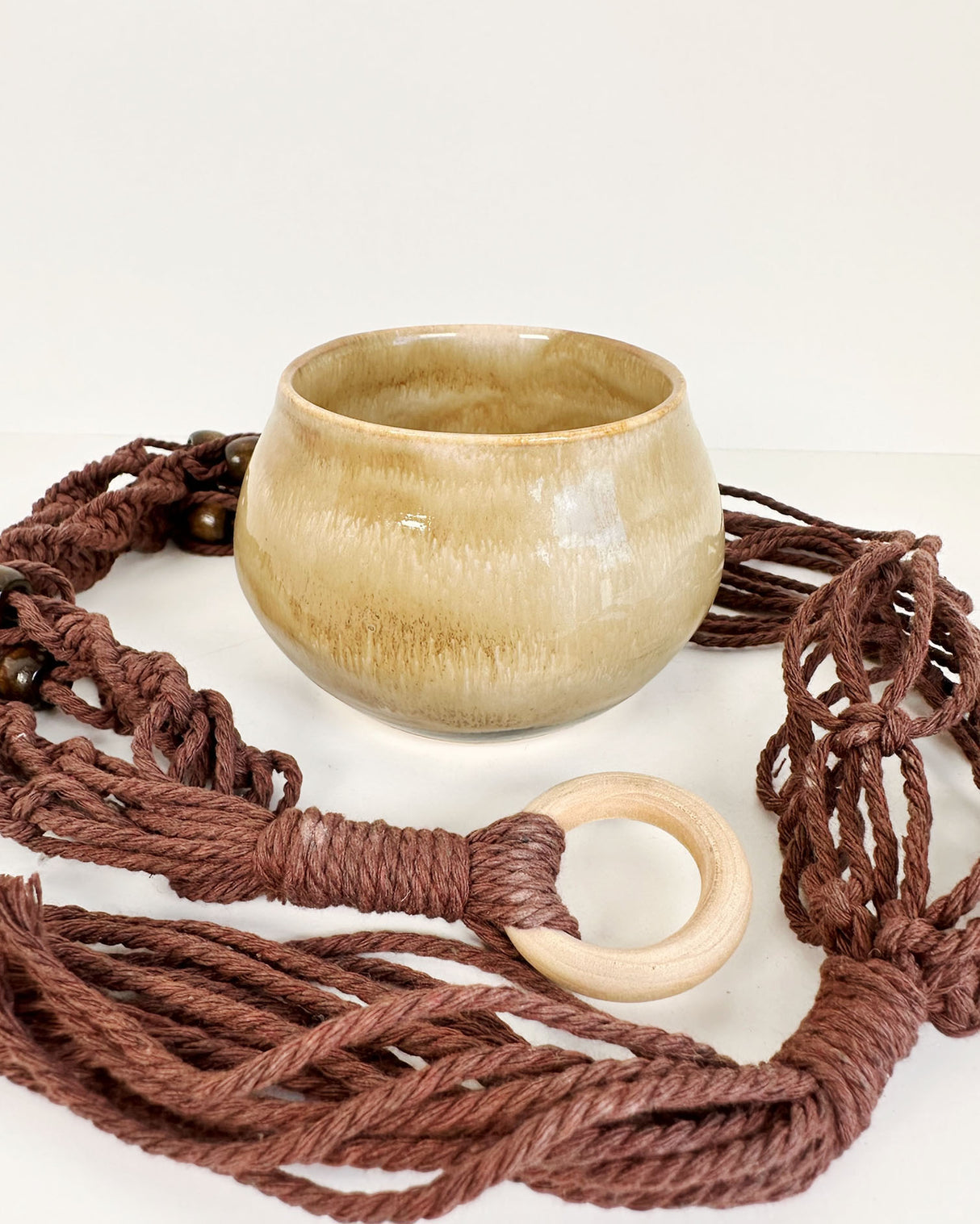Tan-Yellow Stoneware Planter with Brown Macrame Hanger | Lucinda Meglemre