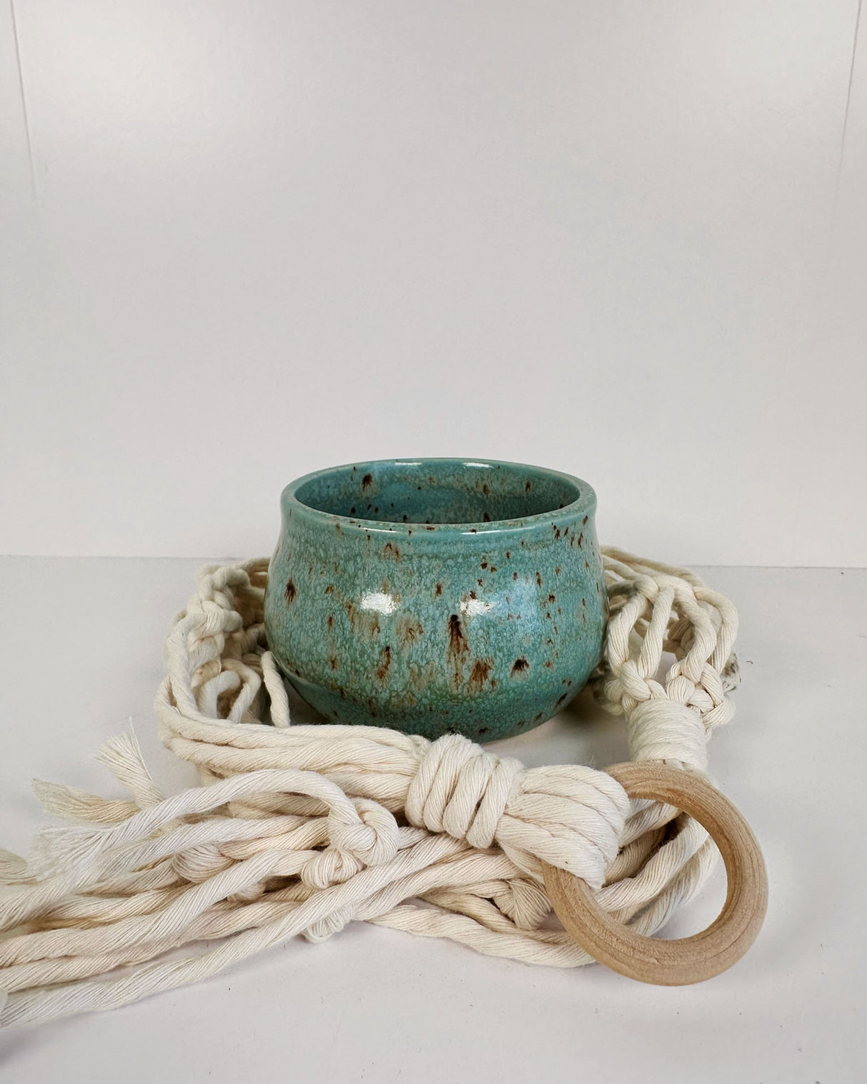 Speckled Turquoise Stoneware Planter with White Macrame Hanger | Lucinda Meglemre