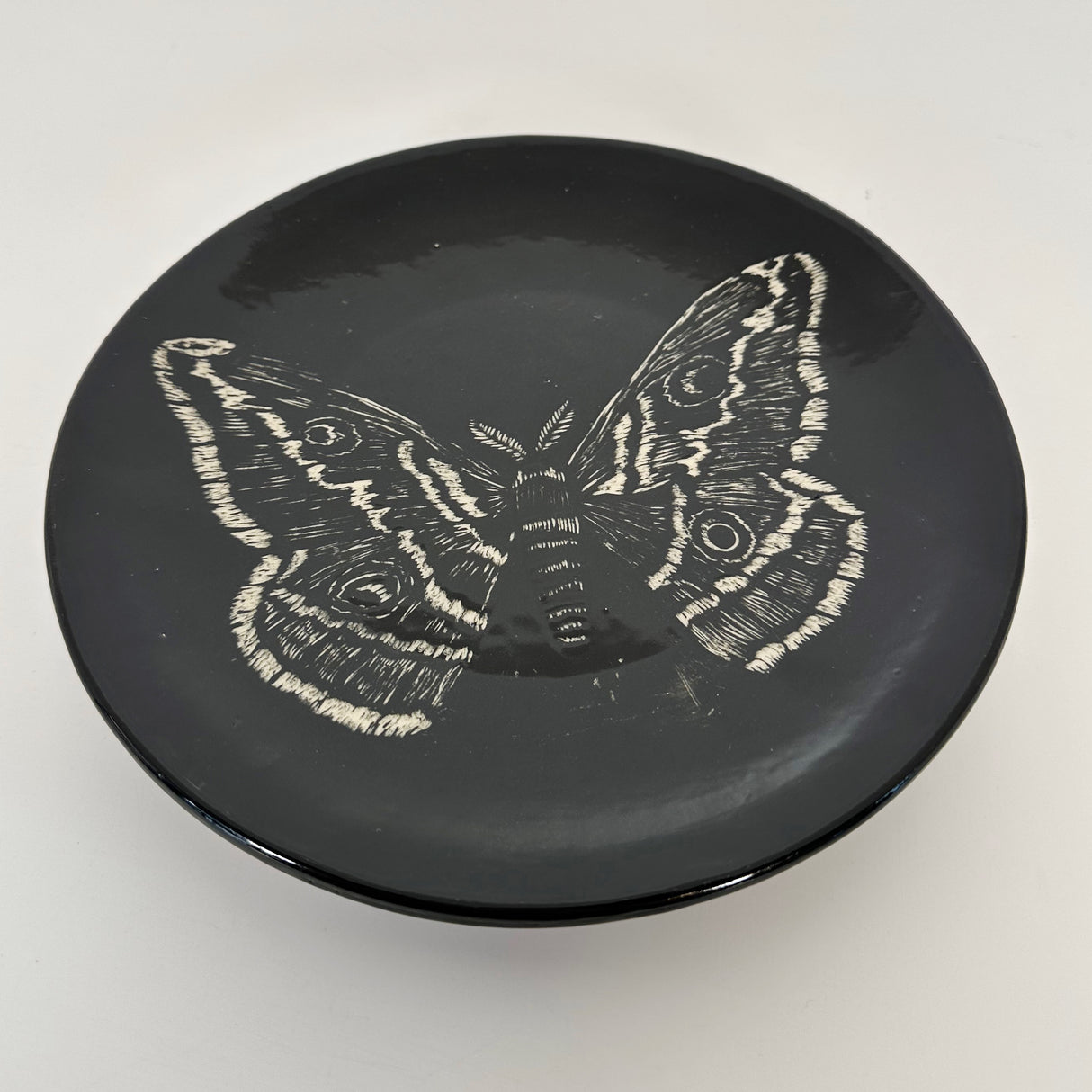 Small Inky Black Carved Moth Plate | Cindy Walker Davidson
