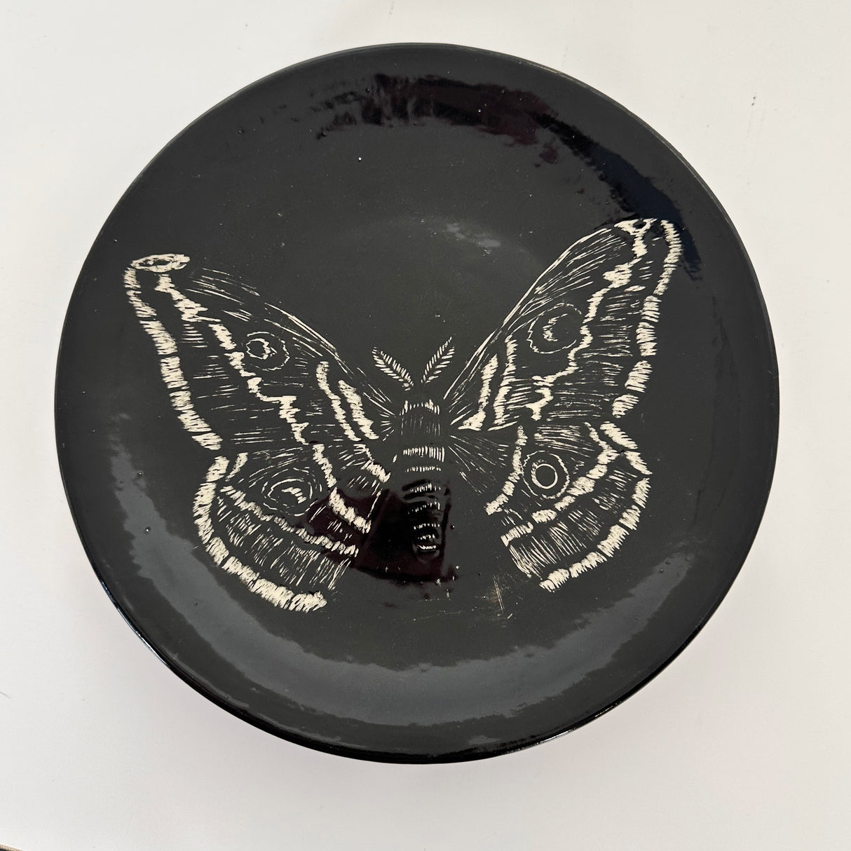 Small Inky Black Carved Moth Plate | Cindy Walker Davidson