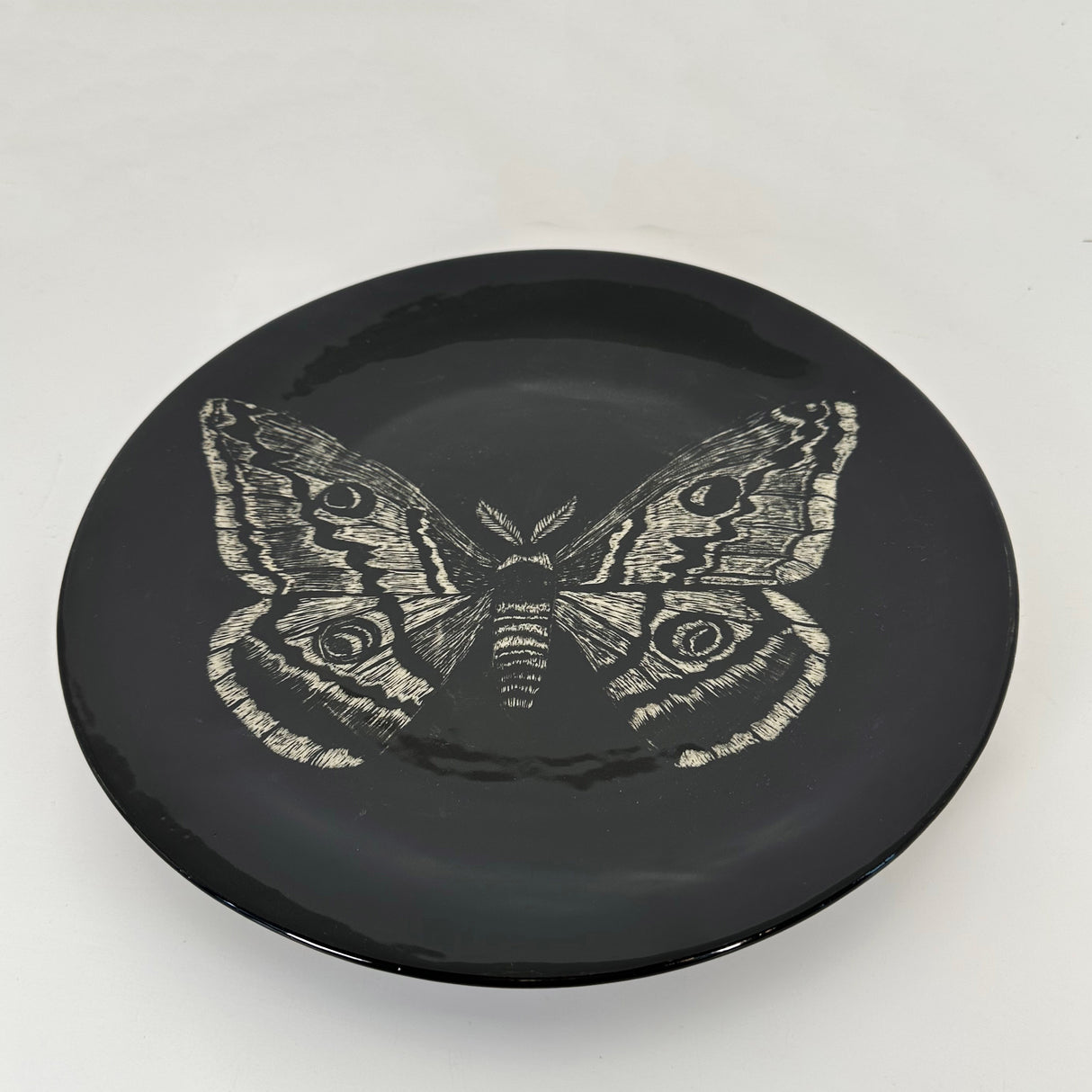 Large Inky Black Carved Moth Plate | Cindy Walker Davidson