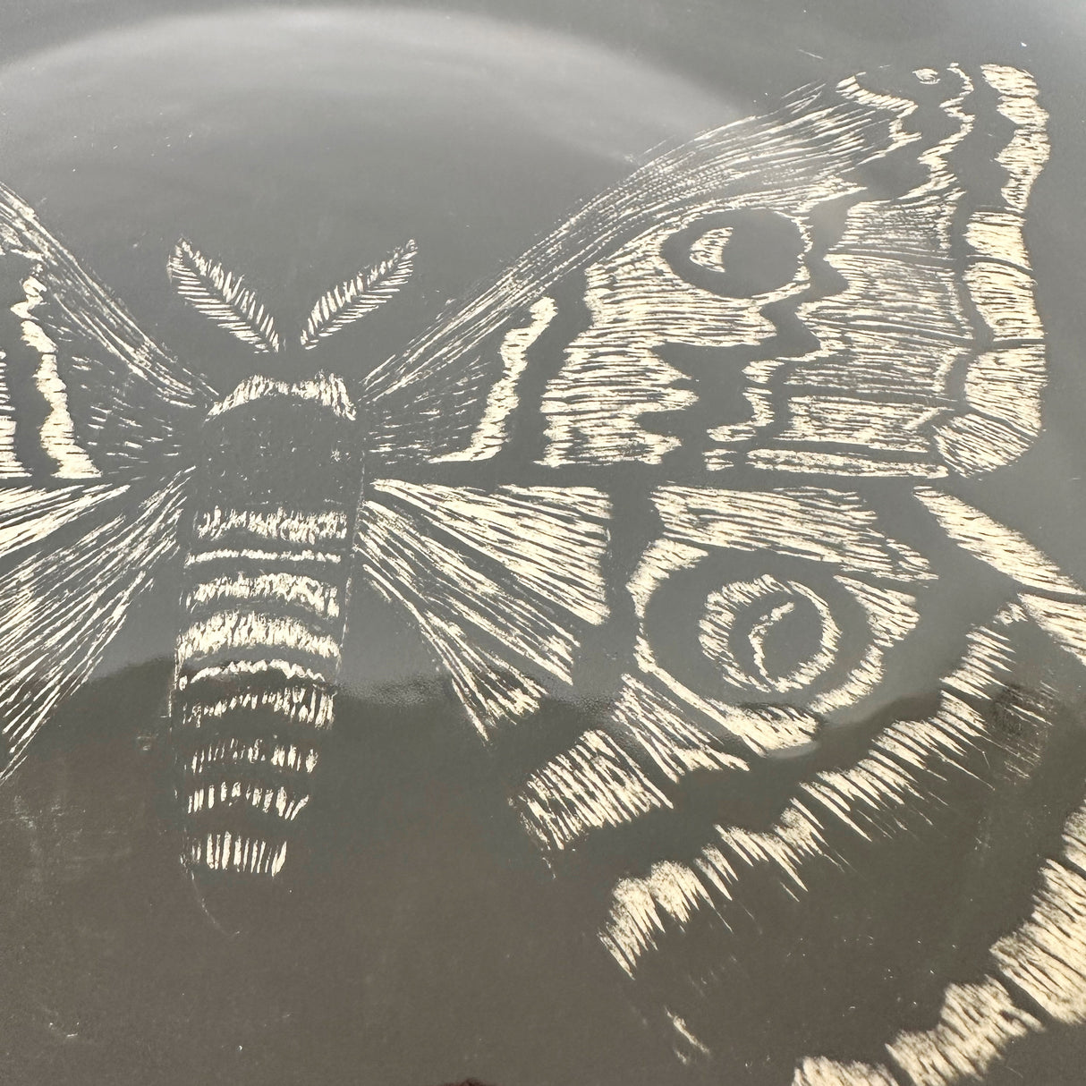 Large Inky Black Carved Moth Plate | Cindy Walker Davidson