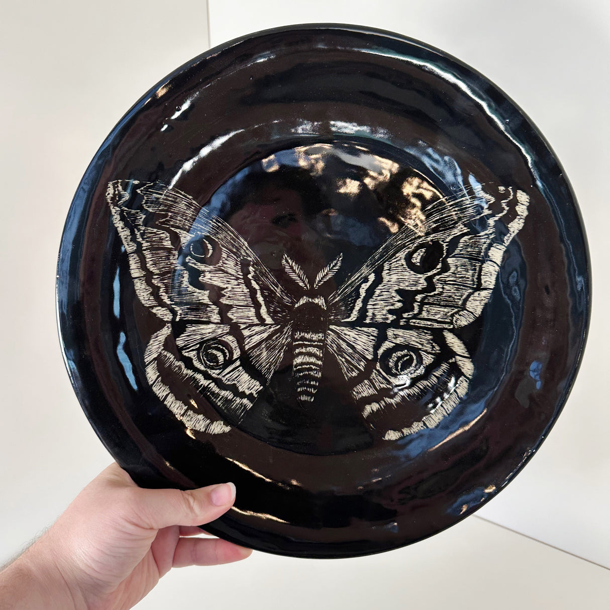 Large Inky Black Carved Moth Plate | Cindy Walker Davidson