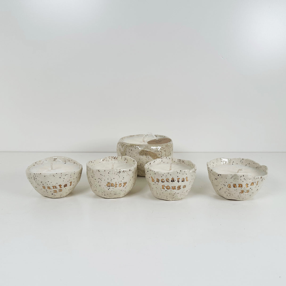 Speckled Stoneware Bowls Featuring 22k Gold and Designer Fragrances | Madeleine Schmidt