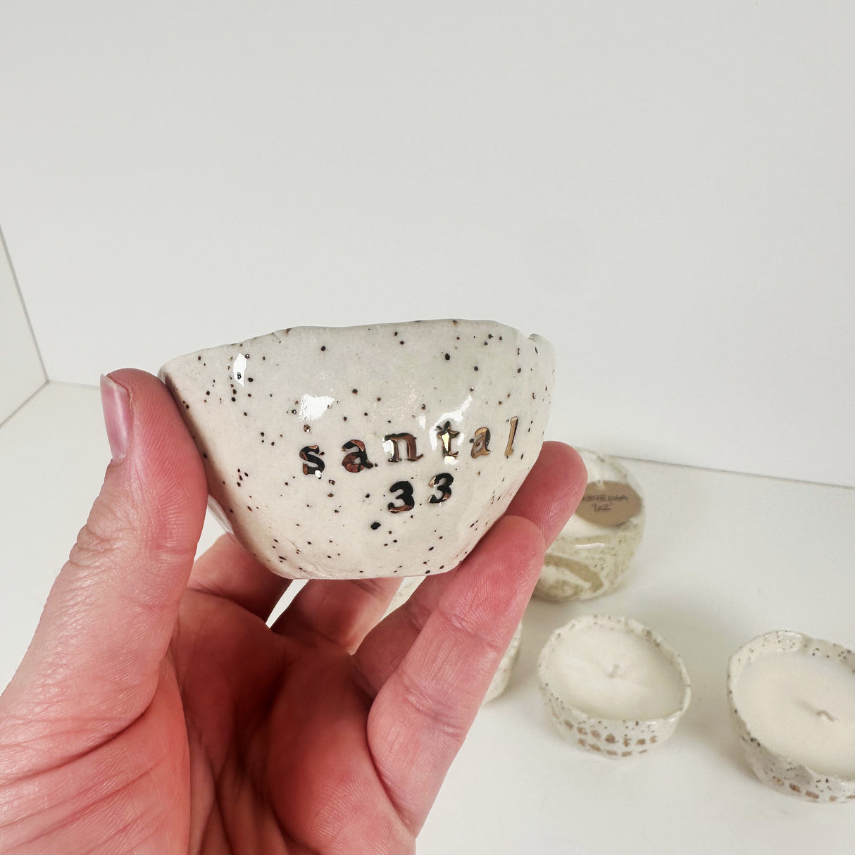 Speckled Stoneware Bowls Featuring 22k Gold and Designer Fragrances | Madeleine Schmidt