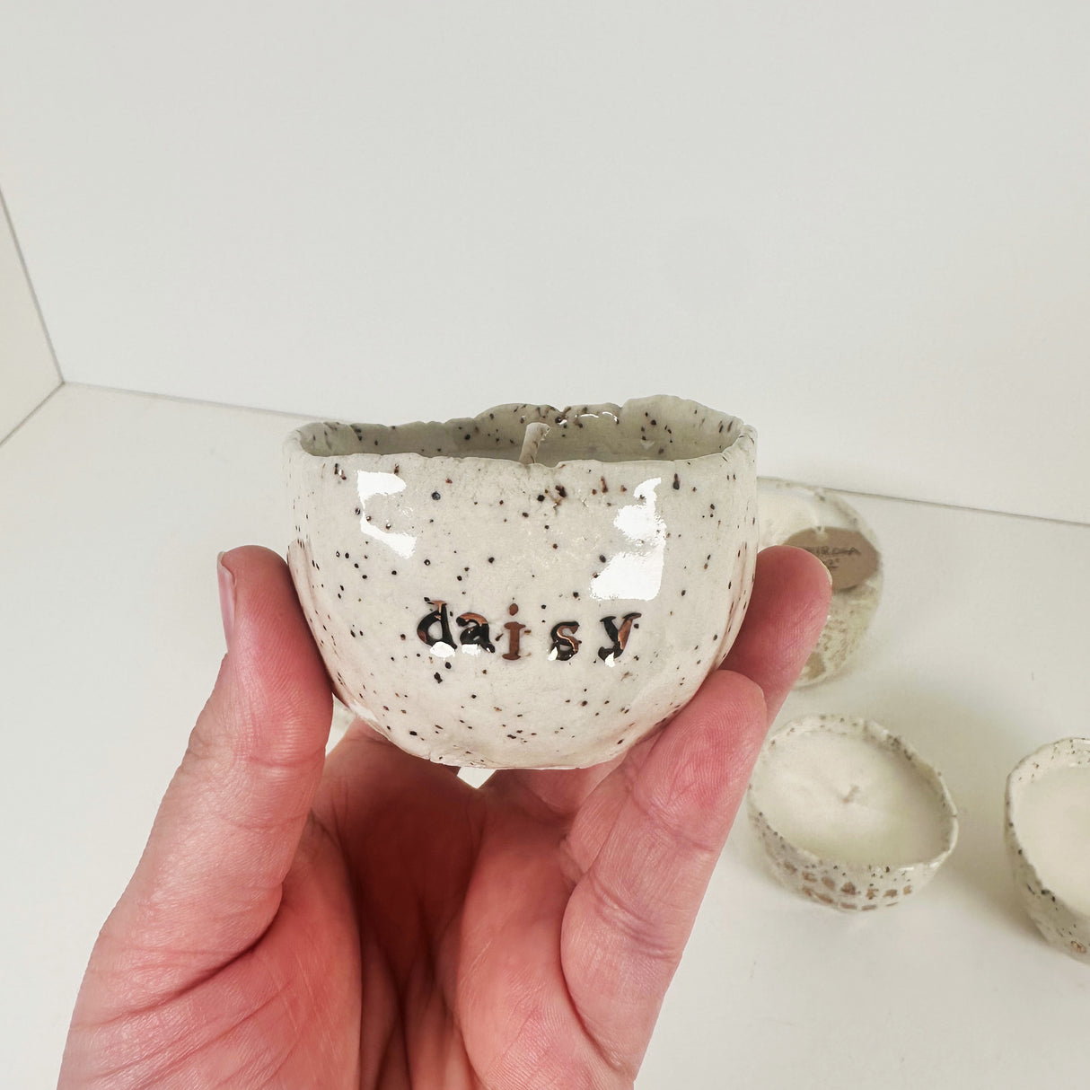 Speckled Stoneware Bowls Featuring 22k Gold and Designer Fragrances | Madeleine Schmidt