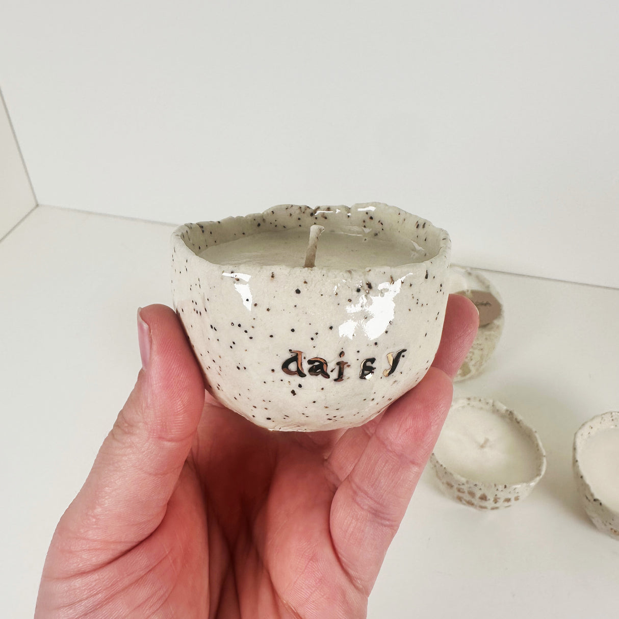 Speckled Stoneware Bowls Featuring 22k Gold and Designer Fragrances | Madeleine Schmidt