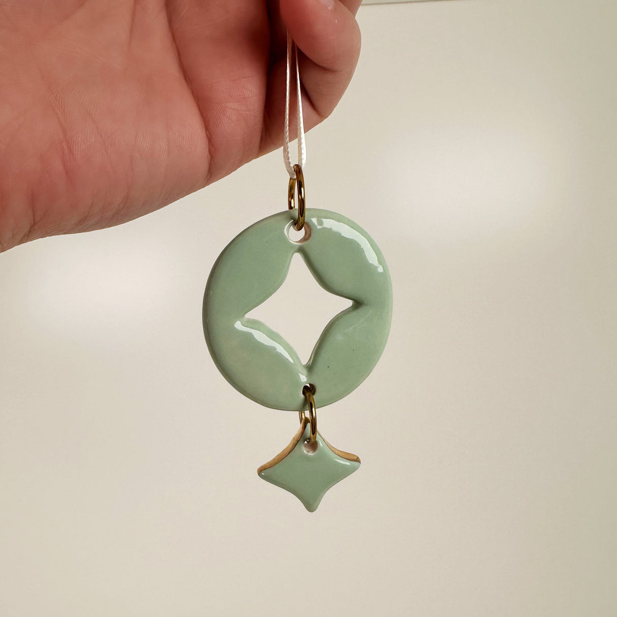 Hand Painted Diamond Cut Out Patterned Ceramic Ornament in Sea Foam Green | Terra Clay