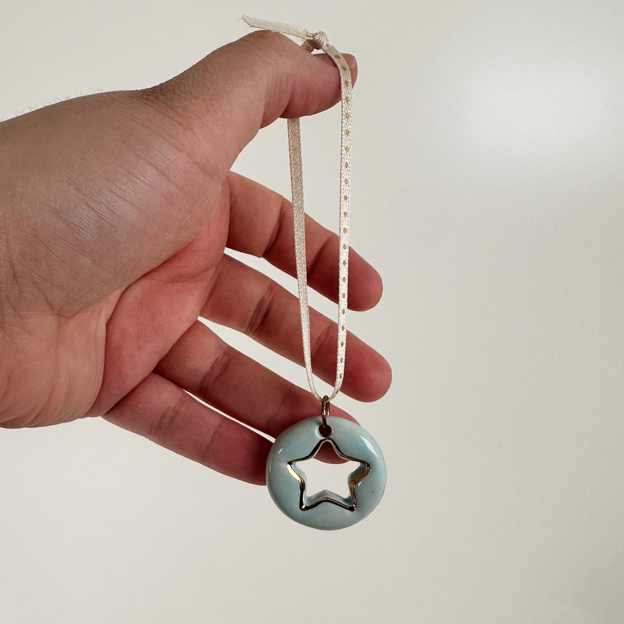 Hand Painted Star Cut Out Ceramic Ornament in Blue | Terra Clay