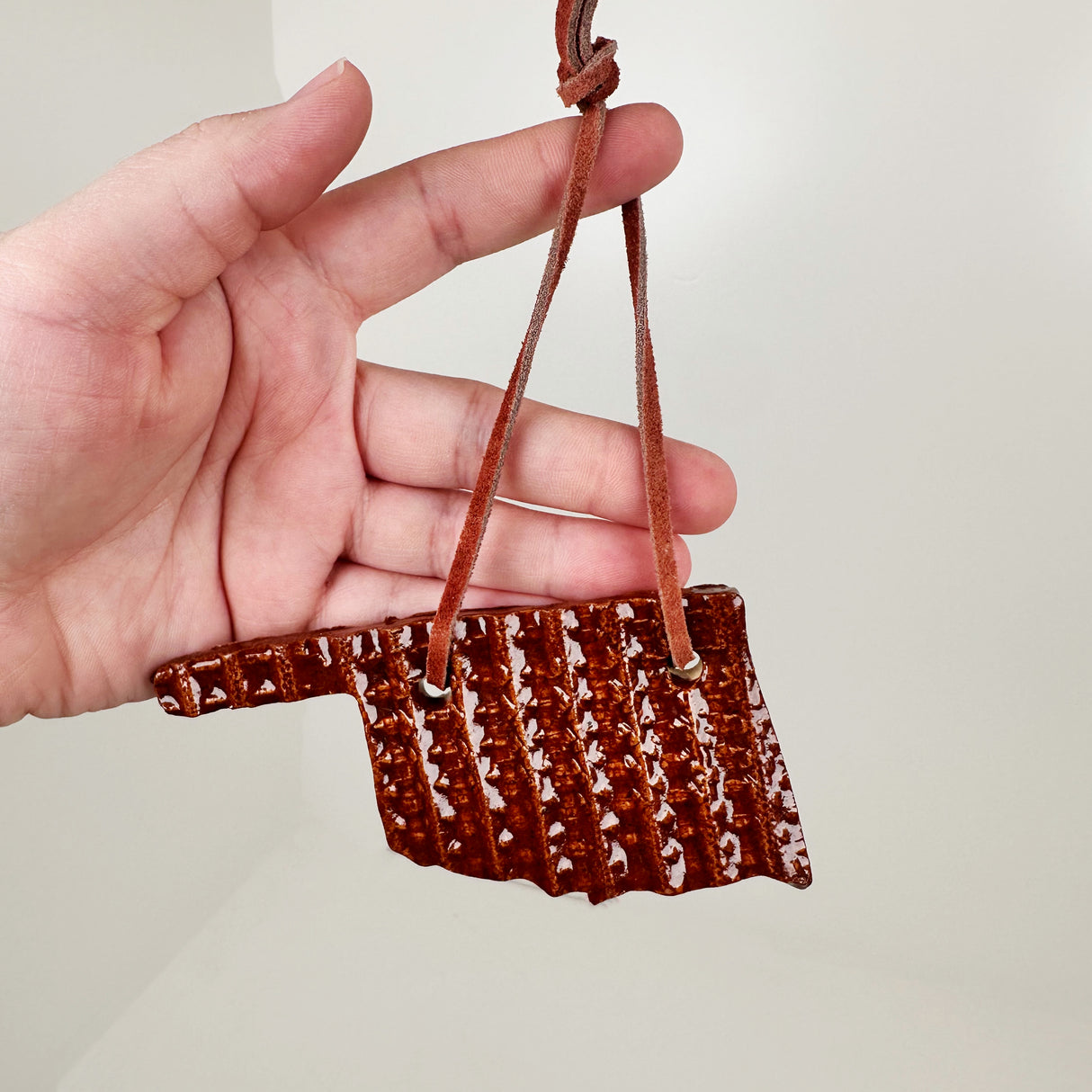 Brown Textured Oklahoma Shaped Ornament | Triska Pottery