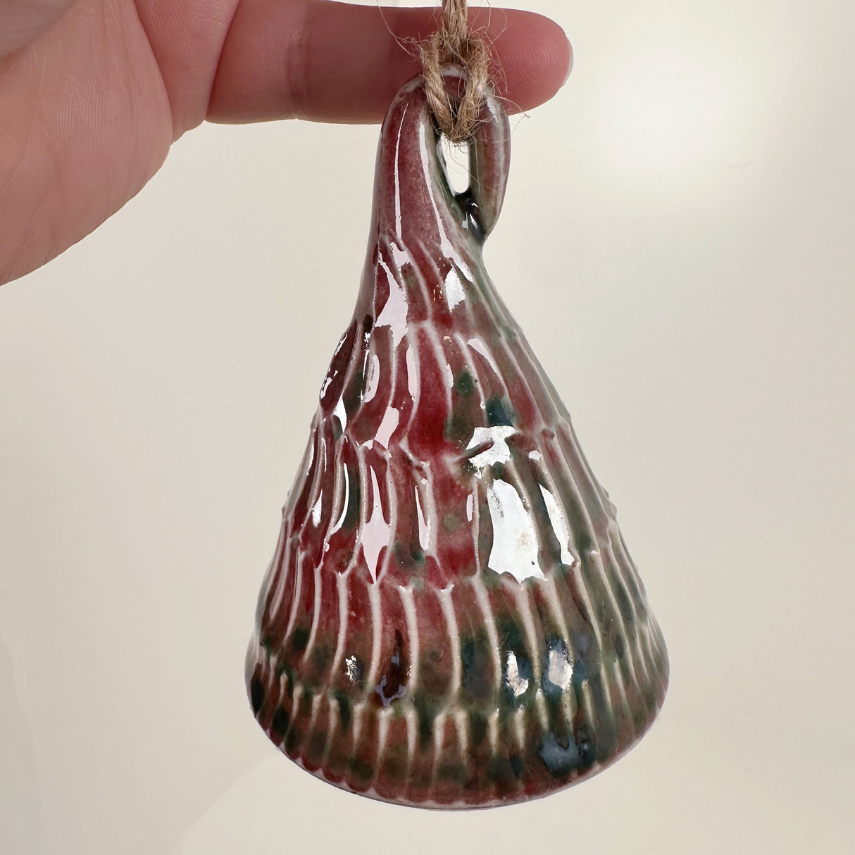 Red & Green Tree Ornament with Carved Details | Catherine Aufdenkamp