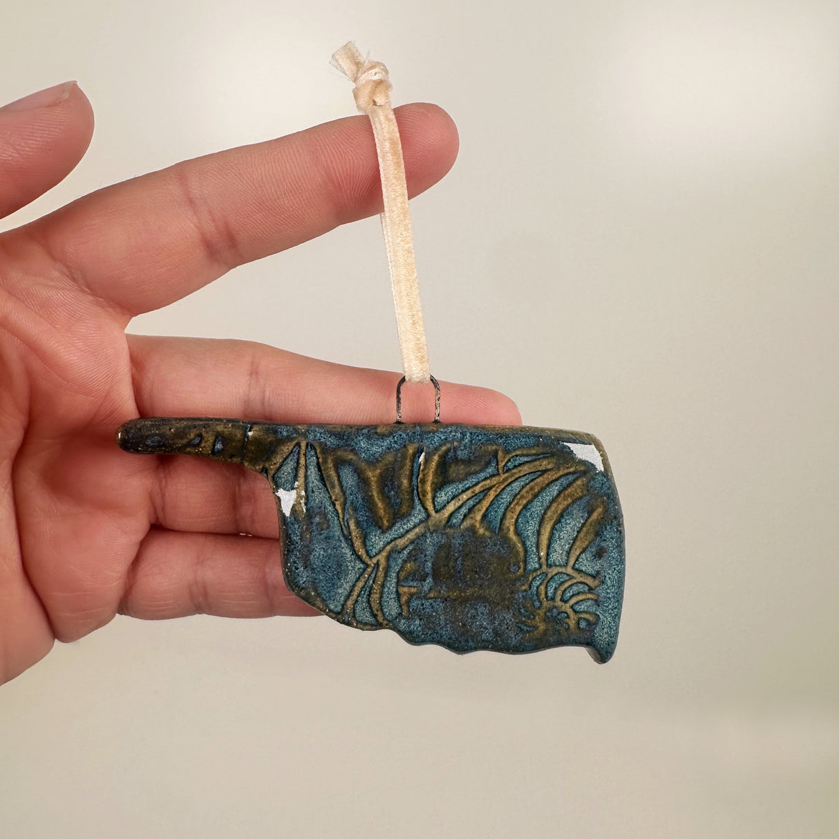 Blue Oklahoma Shaped Ornament with Swirl Imprint- D | Lazy Clay Lady