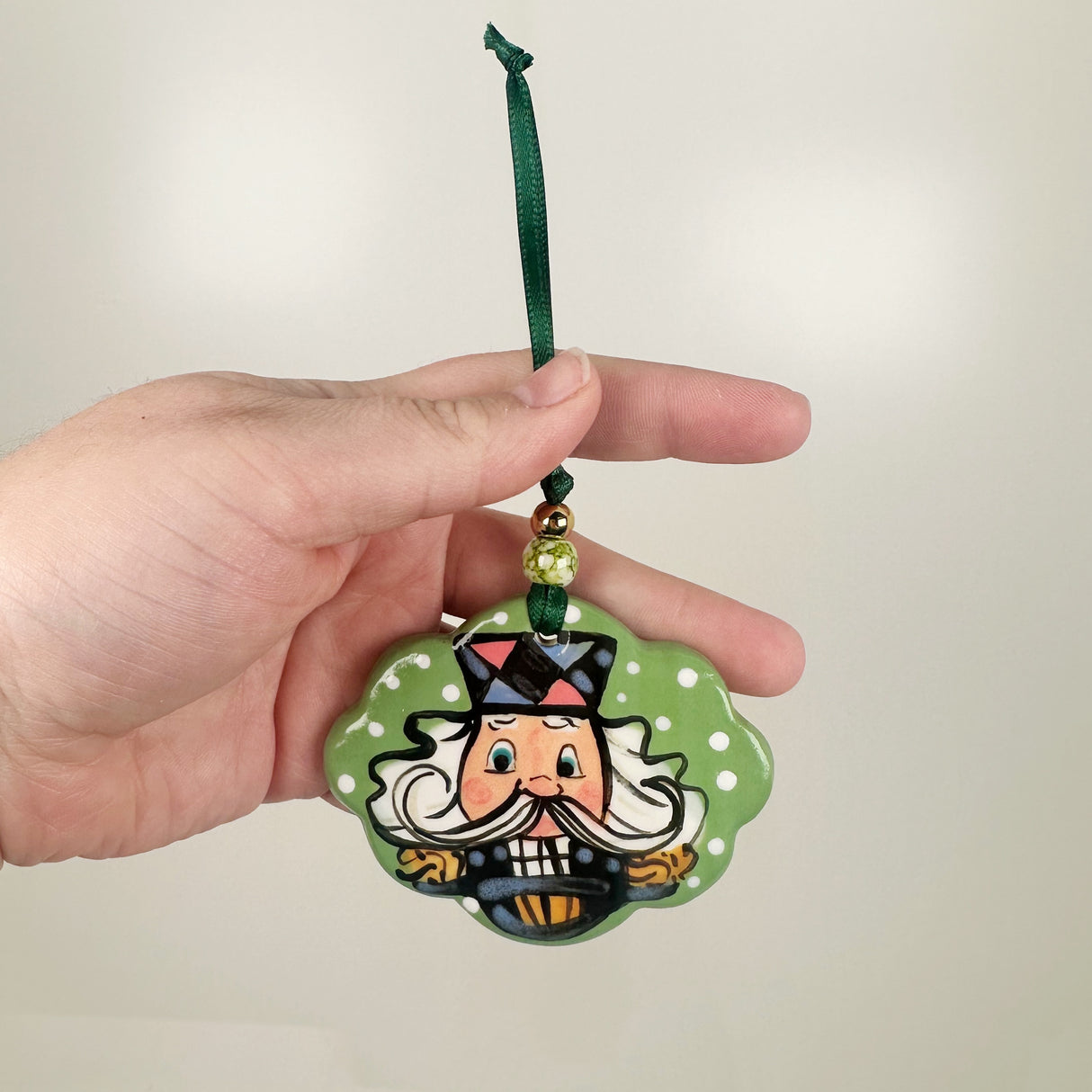 Handpainted Green Scalloped Oval Nutcracker Ornament | Poppy Chick Studio