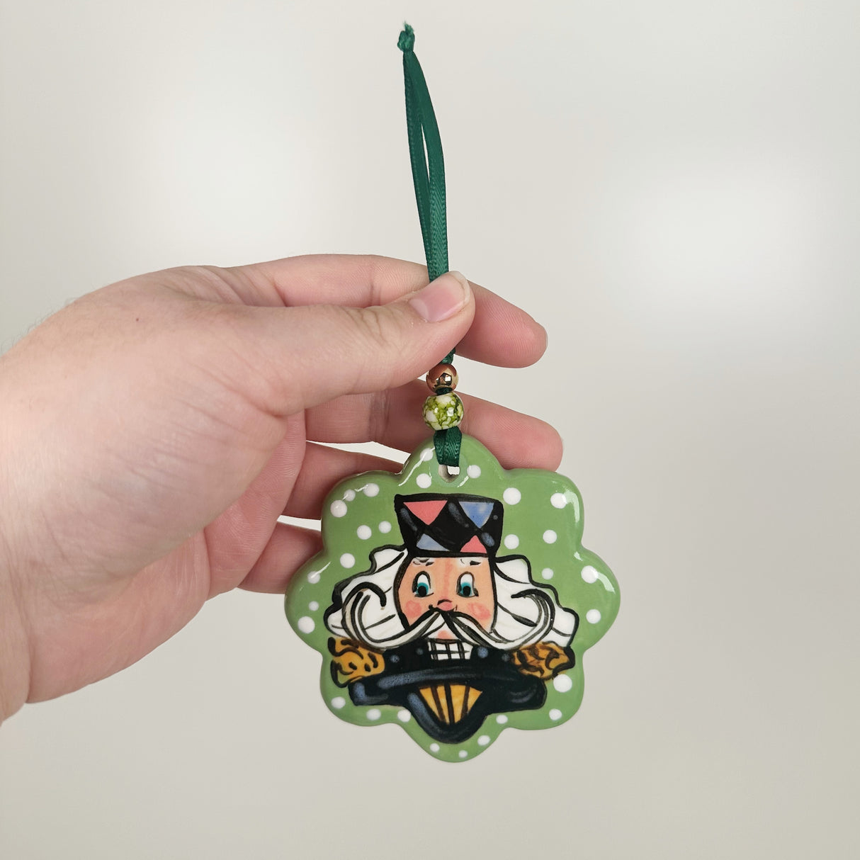Handpainted Green Scalloped Circle Nutcracker Ornament | Poppy Chick Studio