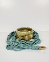 Creamy Yellow Stoneware Planter with Blue Macrame Hanger | Lucinda Meglemre