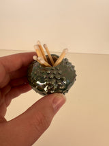 Oil Spot Match Holder and Striker | Madeleine Schmidt