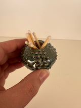 Oil Spot Match Holder and Striker | Madeleine Schmidt