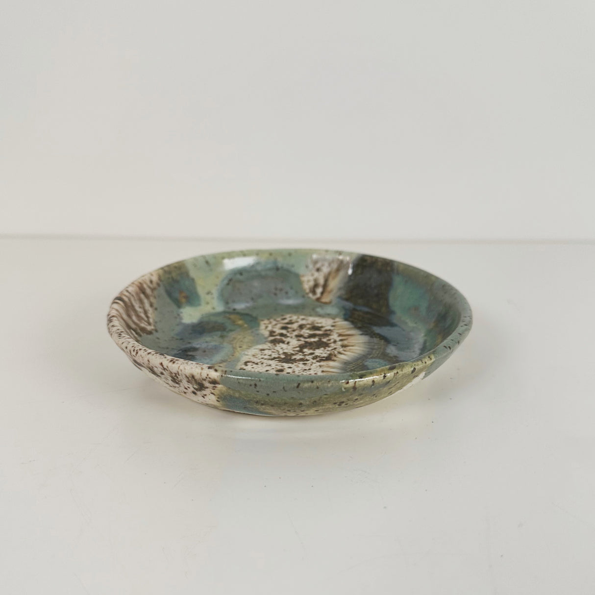 Winter Woods and Blue Green Speckled Stoneware Dishes | Madeleine Schmidt