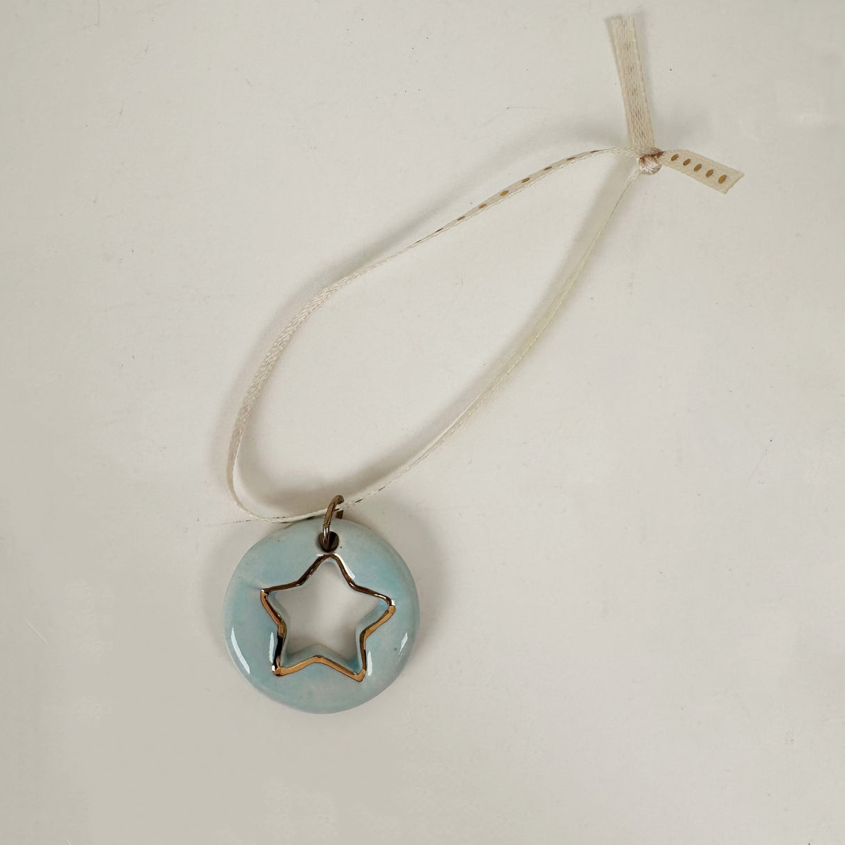 Hand Painted Star Cut Out Ceramic Ornament in Blue | Terra Clay