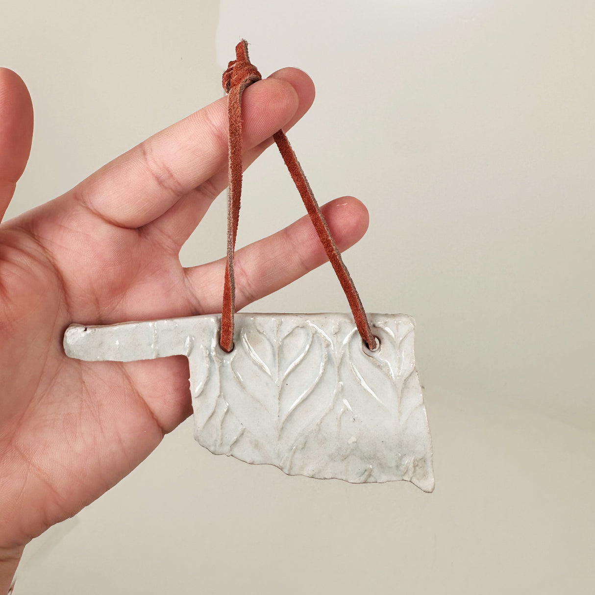 White Herringbone Oklahoma Shaped Ornament | Triska Pottery