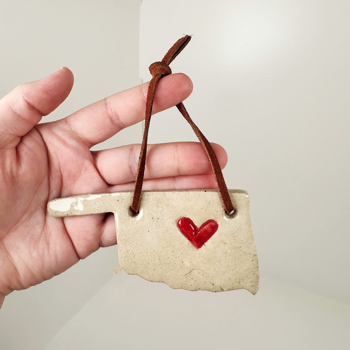 Cream Oklahoma Shaped Ornament with Heart | Triska Pottery