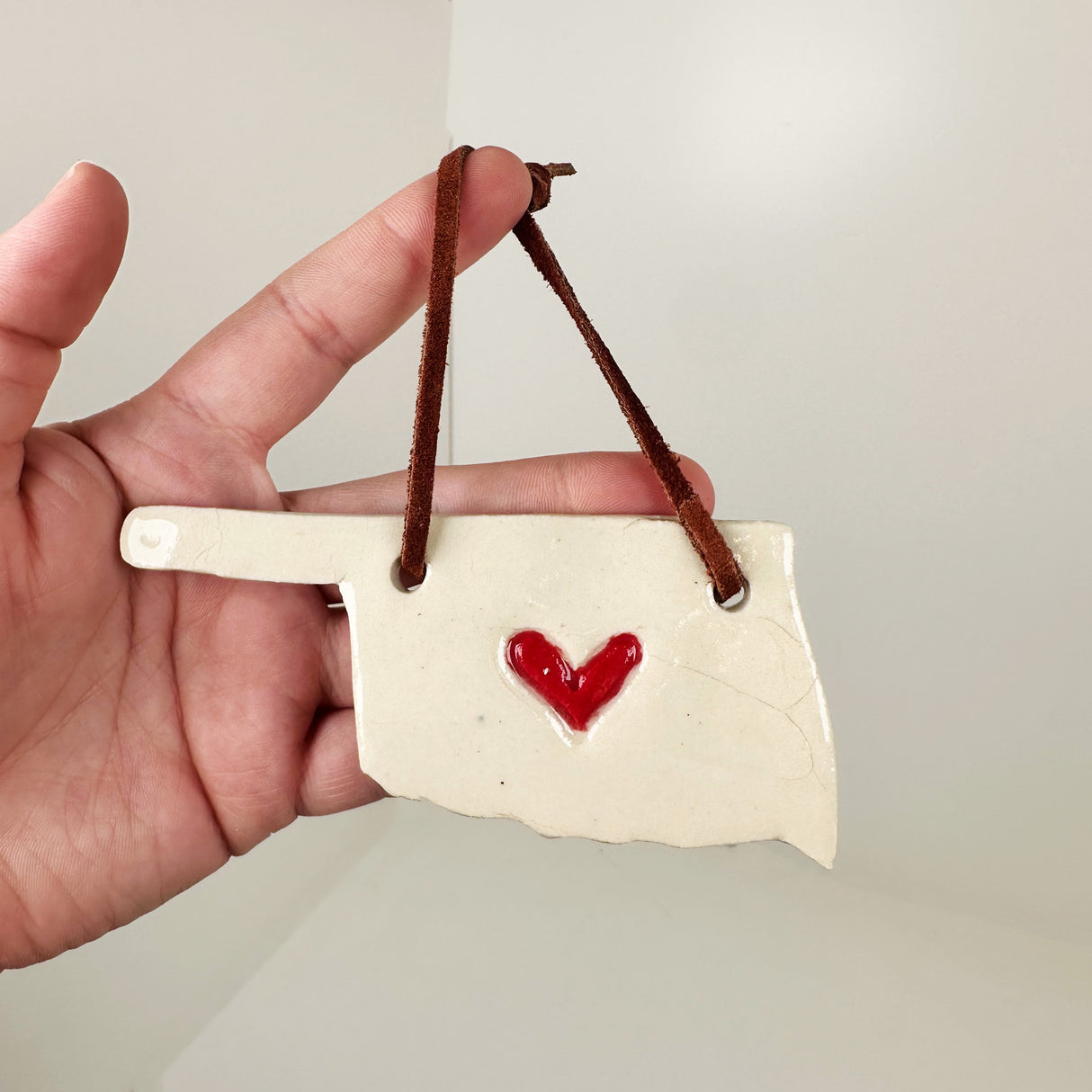 White Oklahoma Shaped Ornament with Heart | Triska Pottery