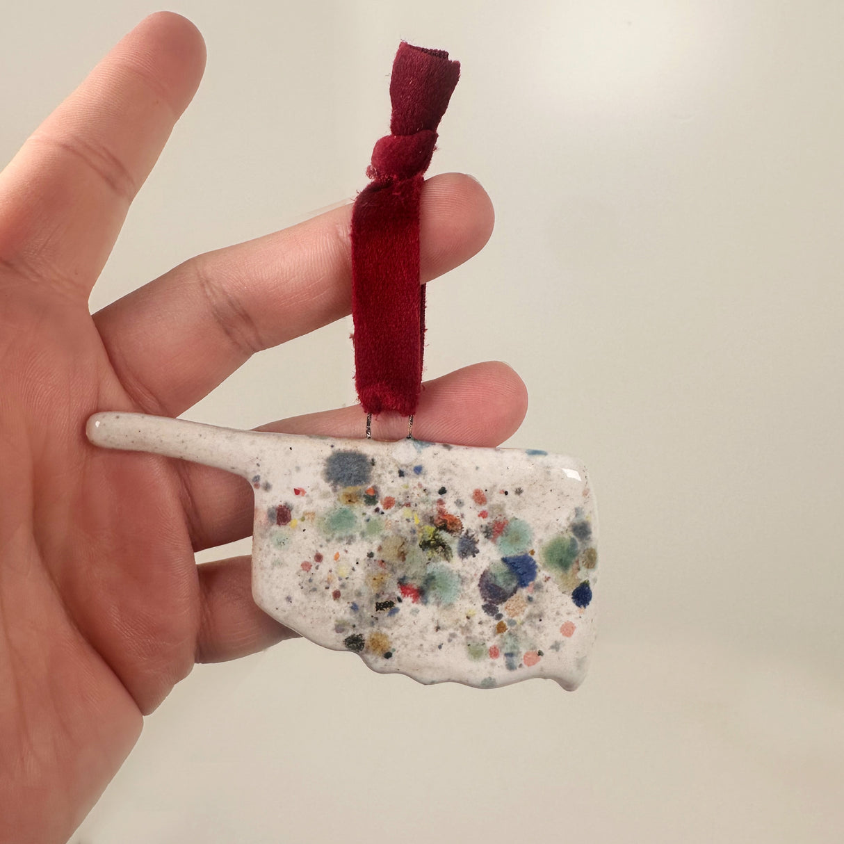 White Speckled Oklahoma Shaped Ornament- C | Lazy Clay Lady