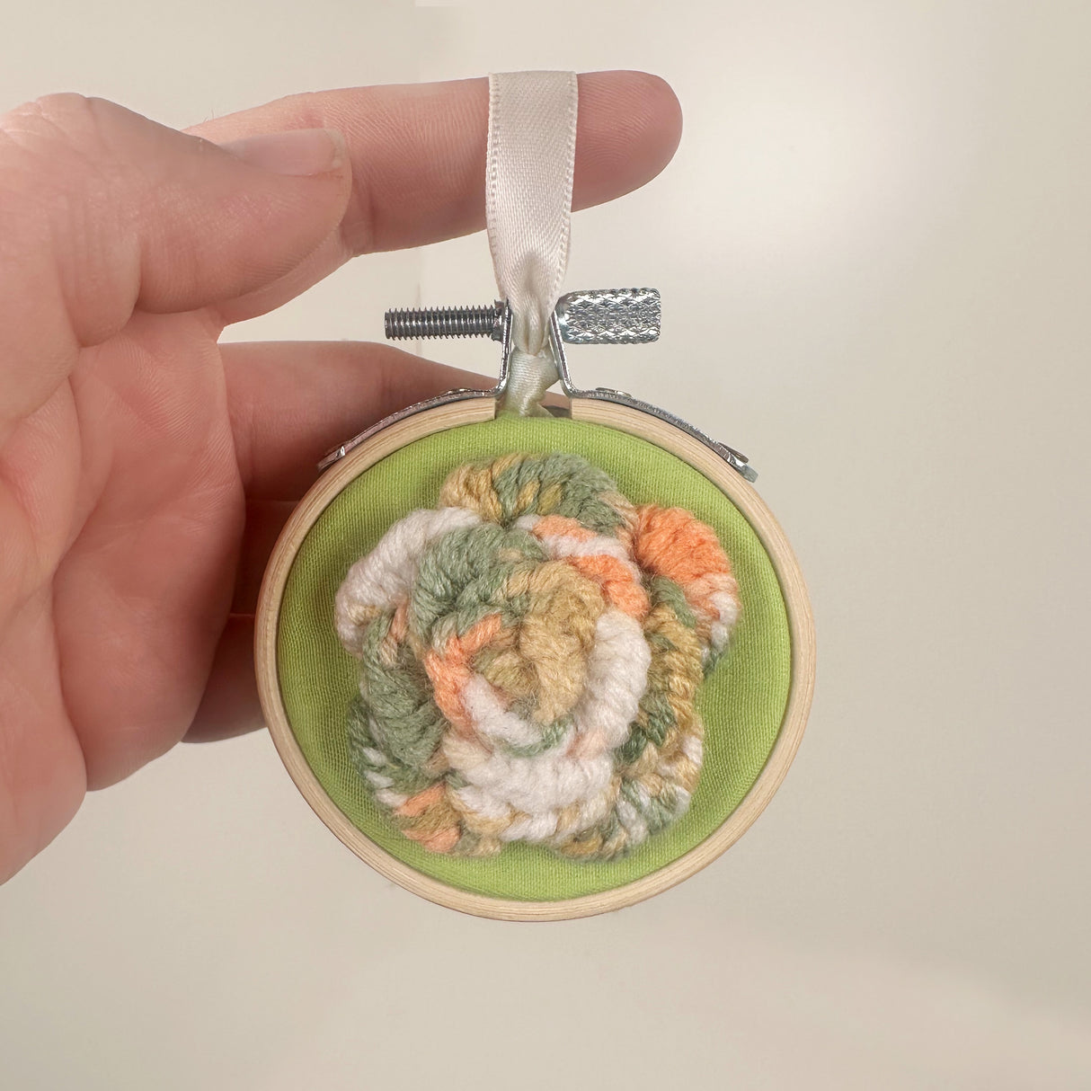 Embroidery Hoop Ornament with Orange & Green Crocheted Flower | Dangit Design