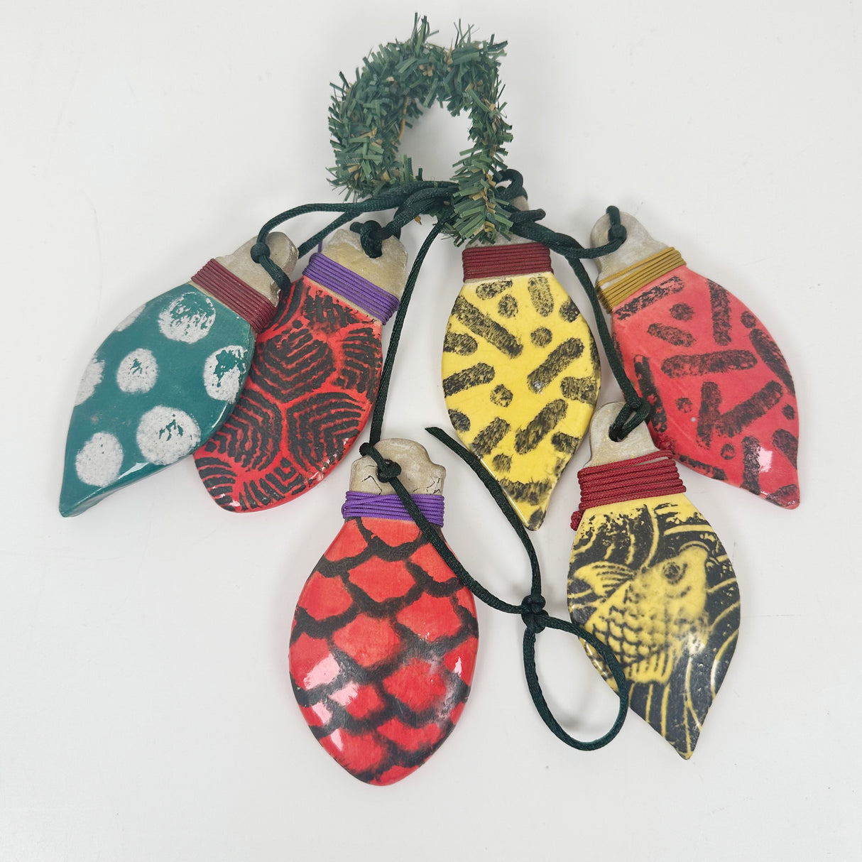 String of Patterned Christmas Light Bulb Ornaments | Lisa Goldfarb