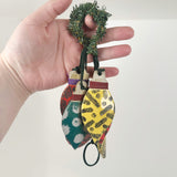 String of Patterned Christmas Light Bulb Ornaments | Lisa Goldfarb