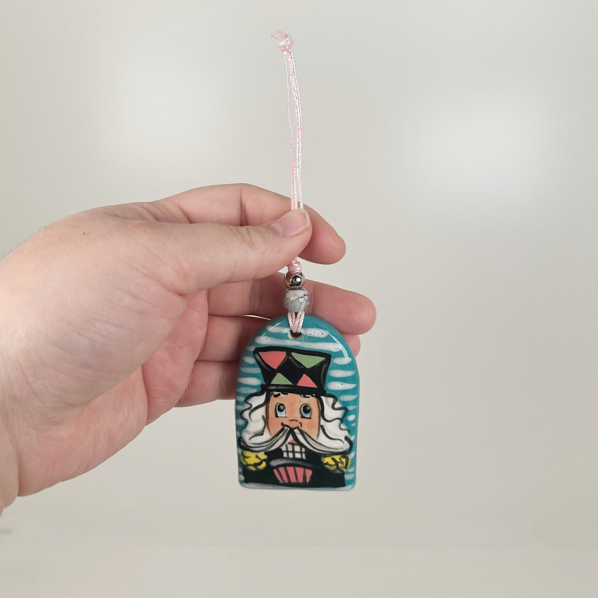 Handpainted Turquoise, Green, & Pink Nutcracker Ornament | Poppy Chick Studio