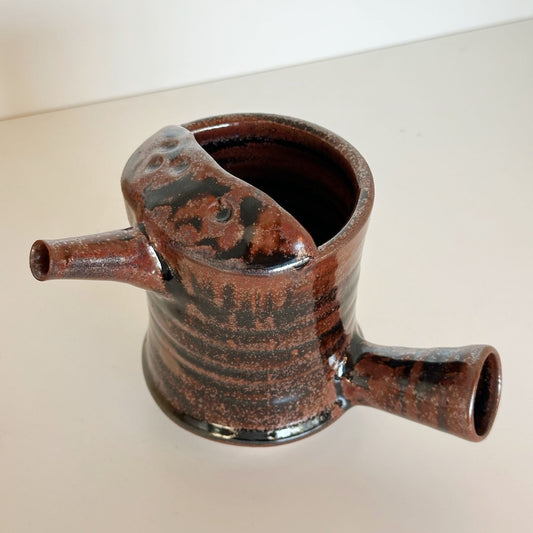 Rust Pouring Vessel | Panther Pots by Ayden Krzmarzick