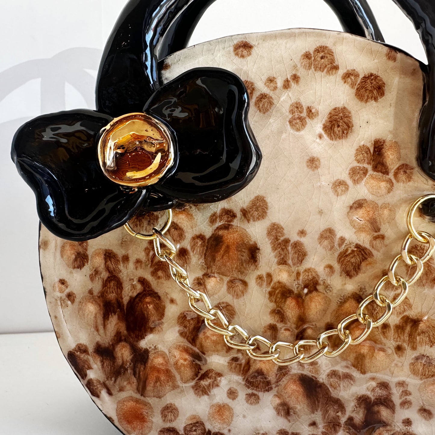 Speckled Purse Vase with Chain Decoration | Jessica Walker