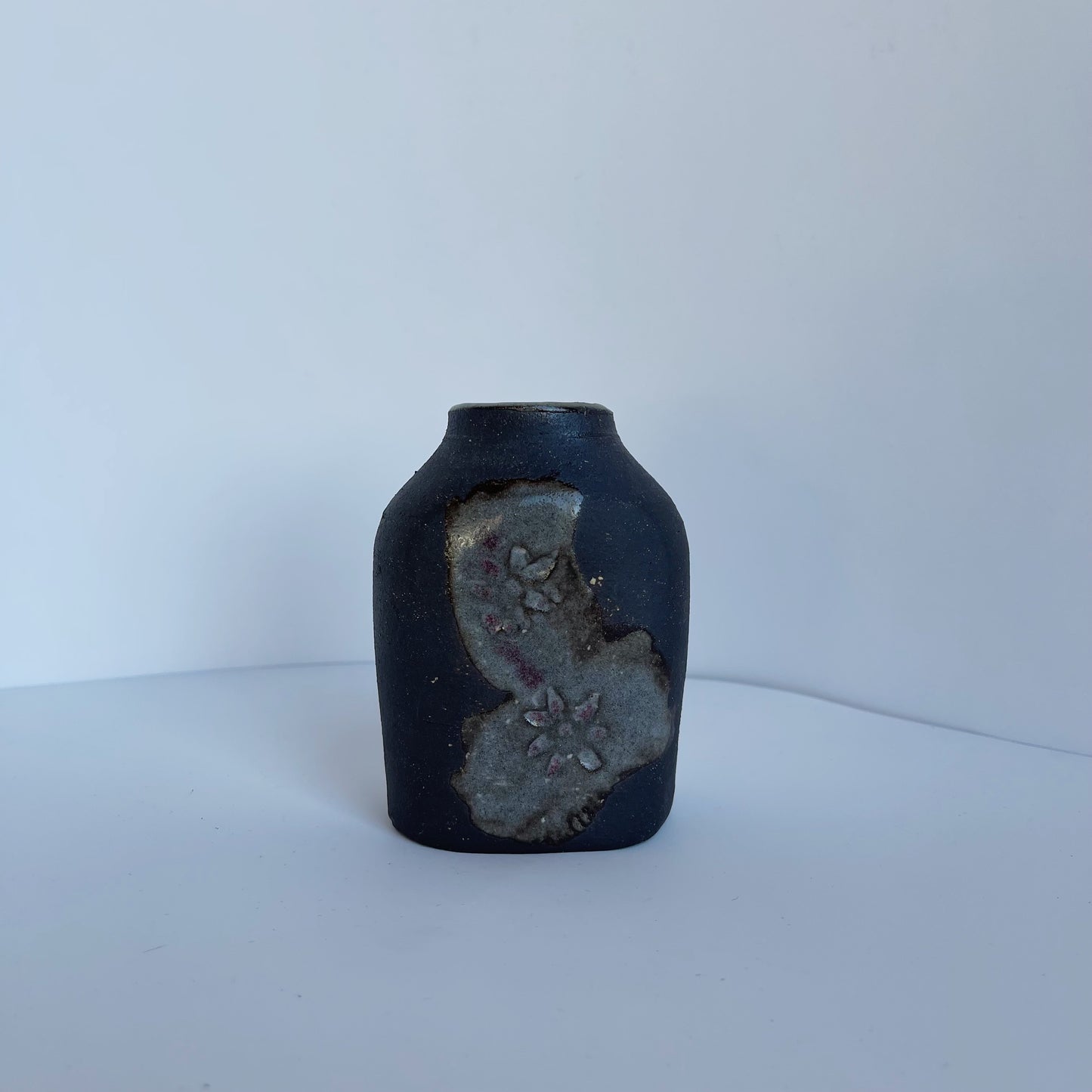 Flower Paddled Bottle | Panther Pots by Joseph Clayton
